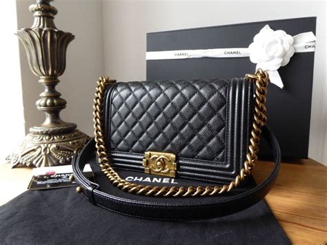 chanel boy bag medium black gold hardware|Chanel boy flap bag price.